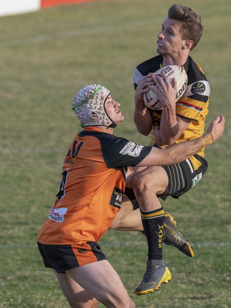 Souths footballer Wade Austin tackles Gatton’s Jayden Williams in last weekend’s Volunteers Cup encounter in Toowoomba. Picture: Nev Madsen