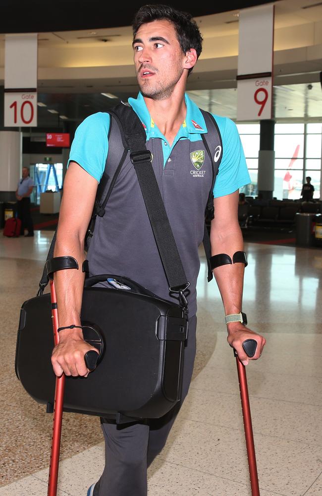 Mitchell Starc arrives at Sydney Airport on Wednesday.