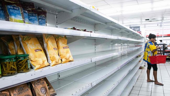 Empty shelves are seen at a supermarket in Noumea on May 16, 2024. Picture: Delphine Mayeur