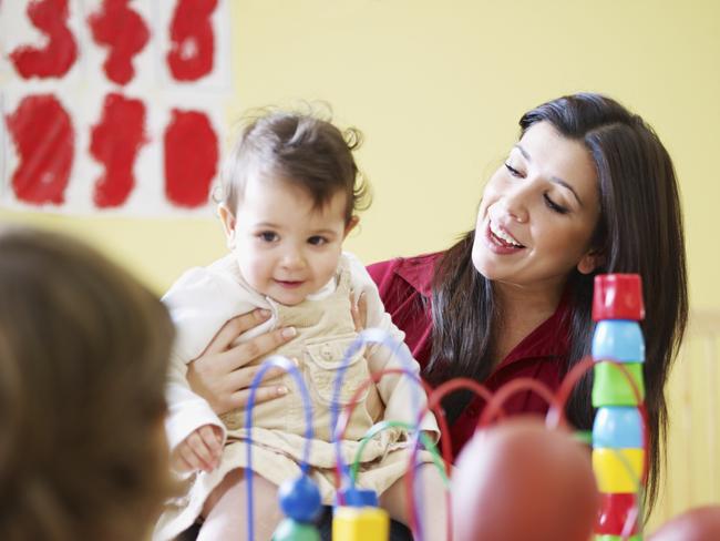 Generic photo of a childcare worker and children in a daycare centre