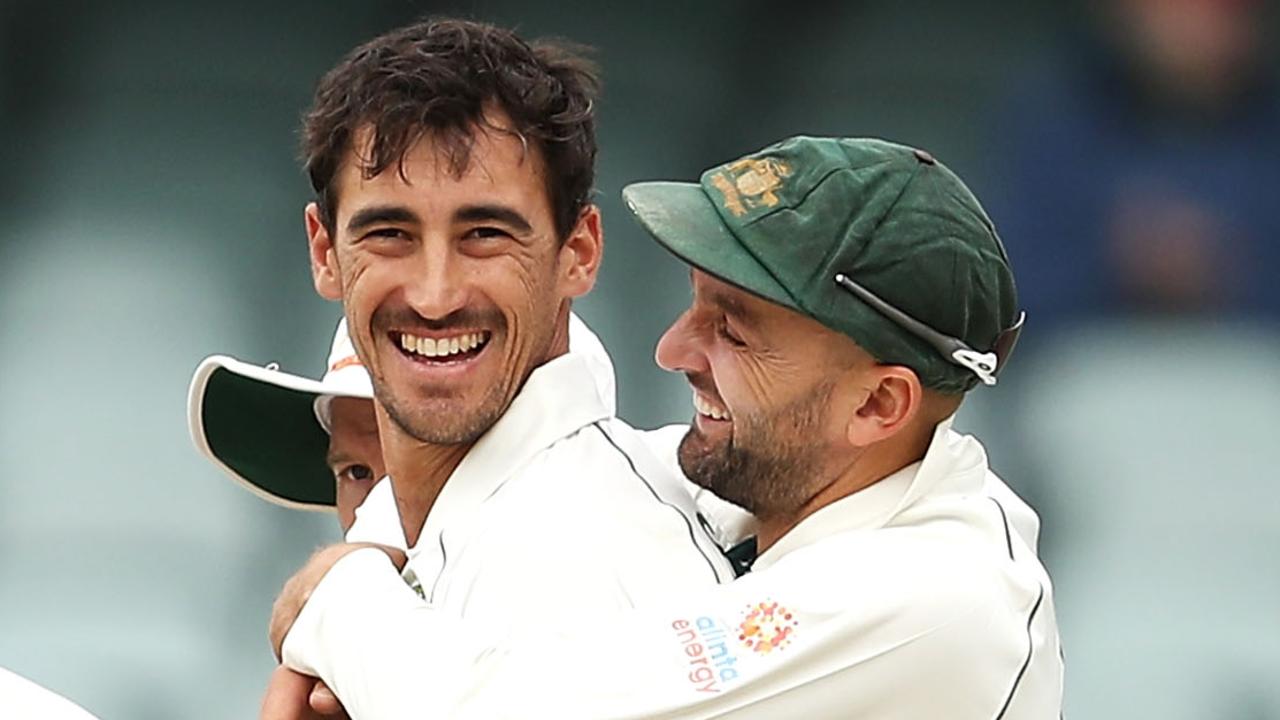 Mitchell Starc and Nathan Lyon of Australia celebrate Starc taking the wicket of Shaheen Afridi.