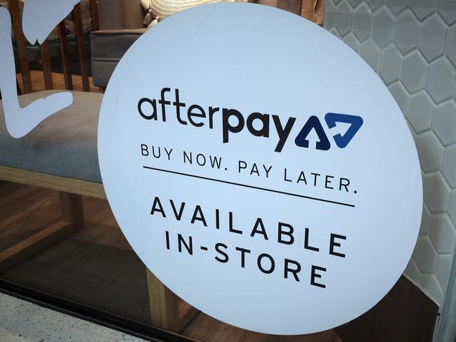 An Afterpay sign is seen in a store window in a shopping centre in Sydney, Tuesday, February 26, 2019. (AAP Image/Derek Rose) NO ARCHIVING