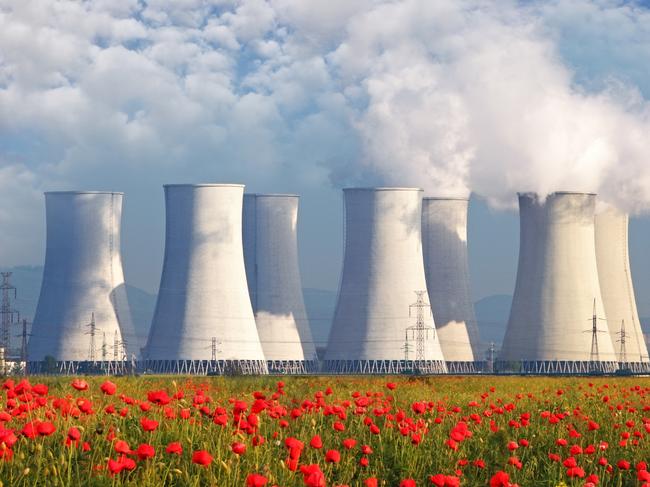 Nuclear Power plant with red field and blue sky