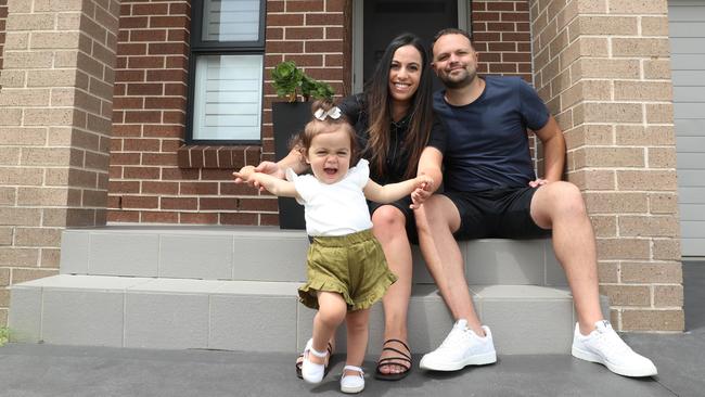 Budget pain ahead … Angela and Joseph Carbone, with daughter Vittoria, 1, bought a home and an investment property in southwest Sydney in 2019. Picture: John Feder