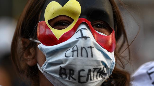 A demonstrators attends a Black Lives Matter protest to express solidarity with US protesters in Sydney on June 6. Picture: Saeed Khan/AFP