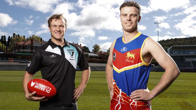 Huonville Lions captain Callum Rawson, right, dons the side’s Indigenous jumper ahead of their SFL grand final rematch alongside Cygnet’s Lachy Watt. Picture: Zak Simmonds