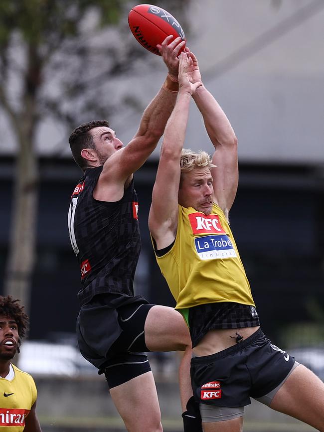 McStay and fellow recruit Billy Frampton contest a high ball in pre-season training, where Frampton has been a standout. Picture: Michael Klein