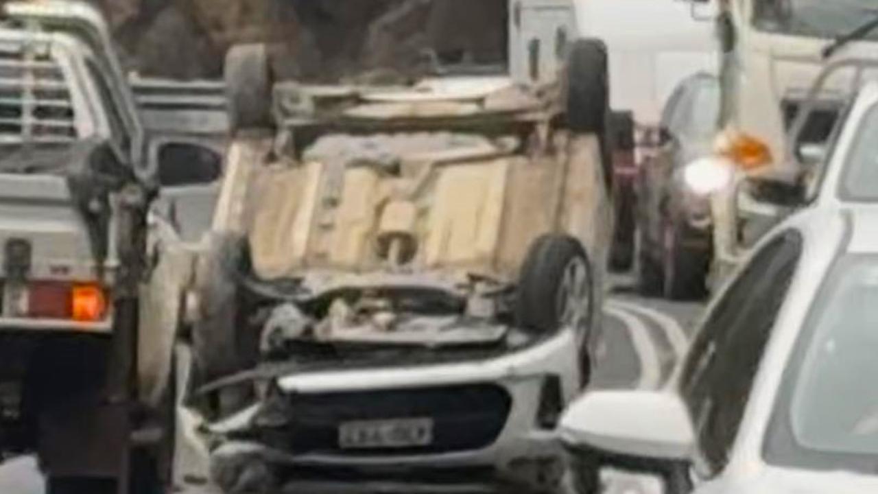 A car that flipped onto its roof has shut down the Gillies Range Road. Picture: Sam Hankin Bra