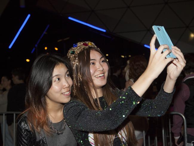 Fans capture the moment at a Lady Gaga concert in Perth.