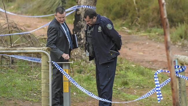 Police and detectives at Hale conservation park near Williamstown after the bones were found. Picture: Roy VanDervegt