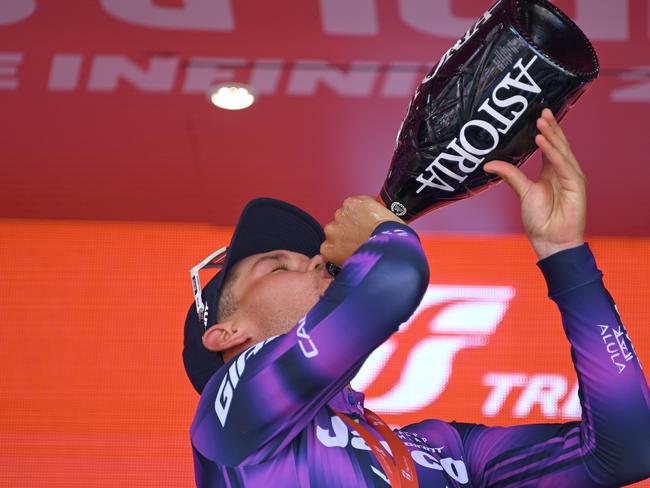 Plapp celebrates his stage win with a bottle of bubbly. Picture: Tim de Waele/Getty Images