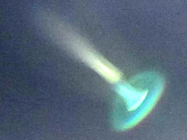 PIC FROM MERCURY PRESS/CATERS NEWS(PICTURED - WHAT IS BELIEVED TO BE A UFO WHICH WAS CATPURED BY HARRY PERTON)A nature blogger was stunned when he appeared to capture a UFO on camera. Harry Perton photographed the unusual object in Groningen, the Netherlands, after he ventured out in a storm to take pictures for his blog last week. But he was stunned when he checked his camera and spotted the jellyfish UFO - so called for its appearance - floating in the night sky emitting an eerie flash of green light. SEE MERCURY COPY