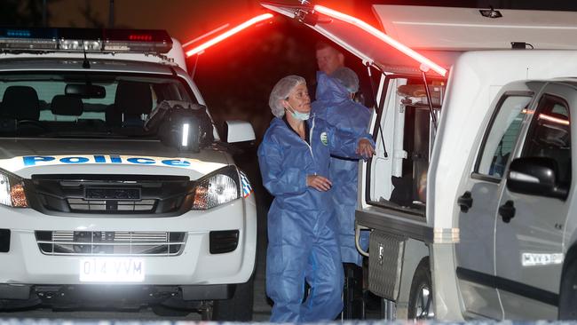 Police at the scene of a Johnston Street unit in Southport have not left the scene since two sudden deaths discovered on Friday. Picture: Richard Gosling