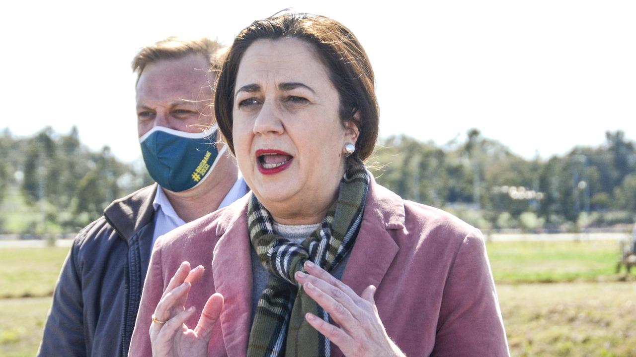 Queensland Premier Annastacia Palaszczuk (front) and Deputy Premier Steven Miles at Wellcamp Airport.