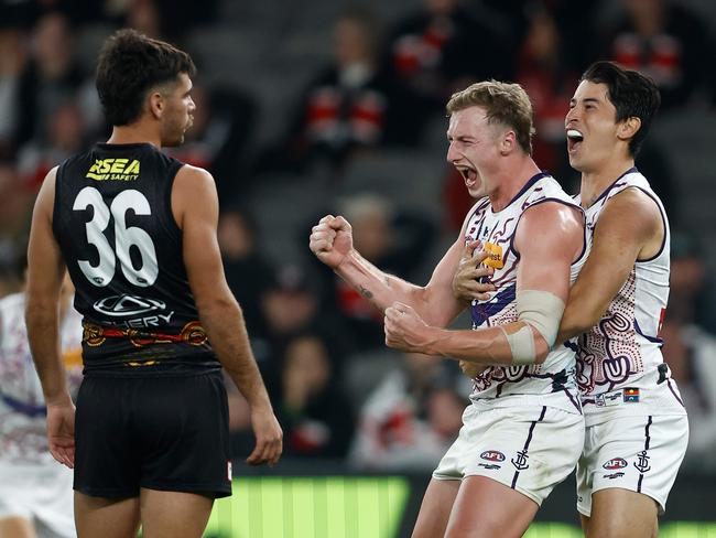 Josh Treacy and Bailey Banfield celebrate a Fremantle goal. Picture: Michael Willson/AFL Photos