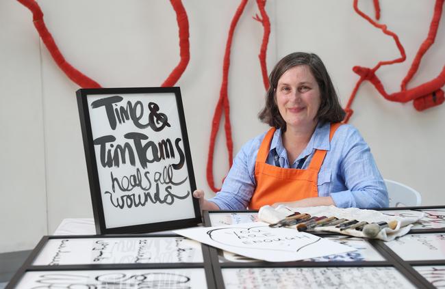 Artist Tilly Lees at Royal Prince Alfred Hospital with her work, Collecting Kindness. A collection of the framed messages will go on permanent display at the hospital in Camperdown. Picture: David Swift.