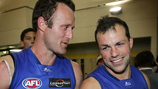 Western Bulldogs’ greatest Chris Grant and Brad Johnson share a moment after one of many matches together.