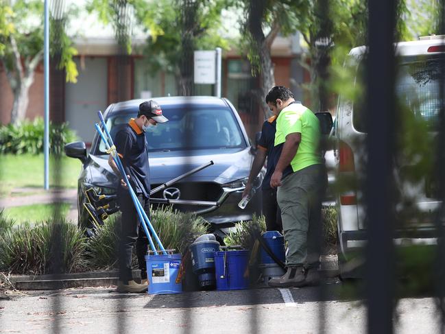 Cleaners arrive at Kincumber High School today. Picture: Sue Graham