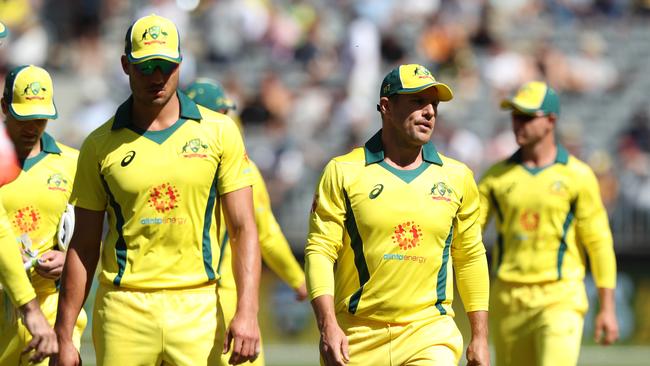 Aaron Finch (second right) of Australia leads his players off the field. Picture: Getty