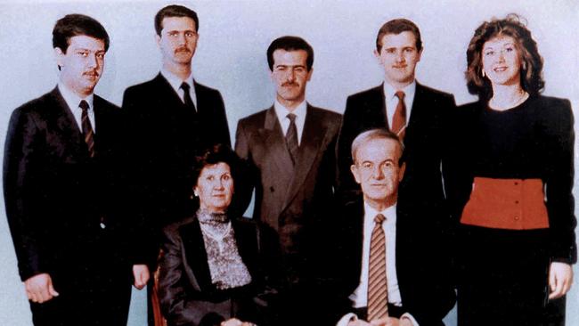 Syrian President Hafez al-Assad with his wife and children in 1985. Bashar is second to left.