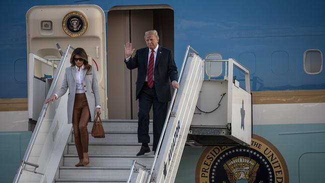 HELSINKI, FINLAND - JULY 15:  U.S. President Donald Trump and first lady, Melania Trump arrive aboard Air Force One at Helsinki International Airport on July 15, 2018 in Helsinki, Finland. President Trump arrived in Helsinki for talks with Russian President Vladimir Putin. Trump said in a recent statement that he has " low expectations" for the meeting, however he is under increasing pressure to confront the Russian President directly about special counsel Robert Mueller's indictment of twelve Russians said to have conspired to sway the decision of the 2016 US election.  (Photo by Chris McGrath/Getty Images)