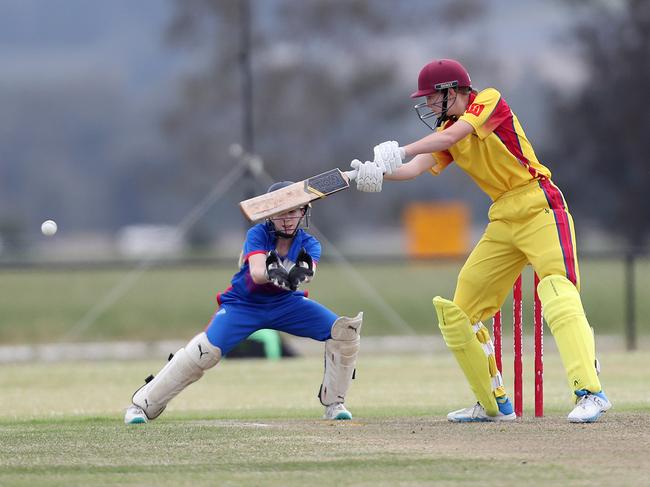 Jessica Bramble cuts the ball for Greater Illawarra at last season’s U19 Country Championships. Picture: Sue Graham