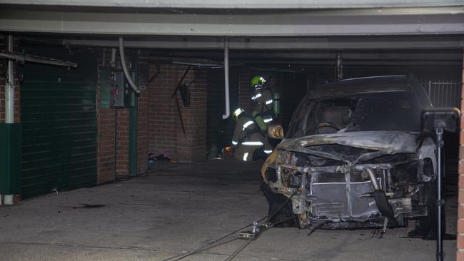 They discovered a 4WD was well alight in a car park. Pictures: Dean Asher 