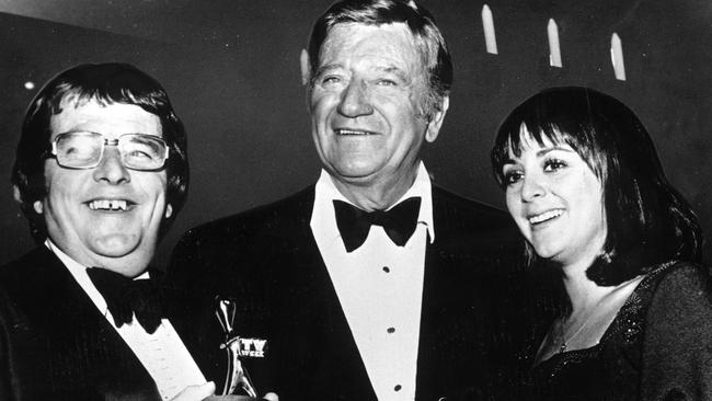 Ernie Sigley and Denise Drysdale with the Duke of Westerns, John Wayne, at the Logie Awards, 1975.