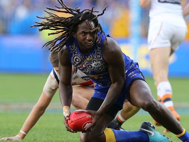 PERTH, AUSTRALIA - JULY 08: Nic Naitanui of the Eagles looks to handball during the round 16 AFL match between the West Coast Eagles and the Greater Western Sydney Giants at Optus Stadium on July 8, 2018 in Perth, Australia.  (Photo by Paul Kane/Getty Images)