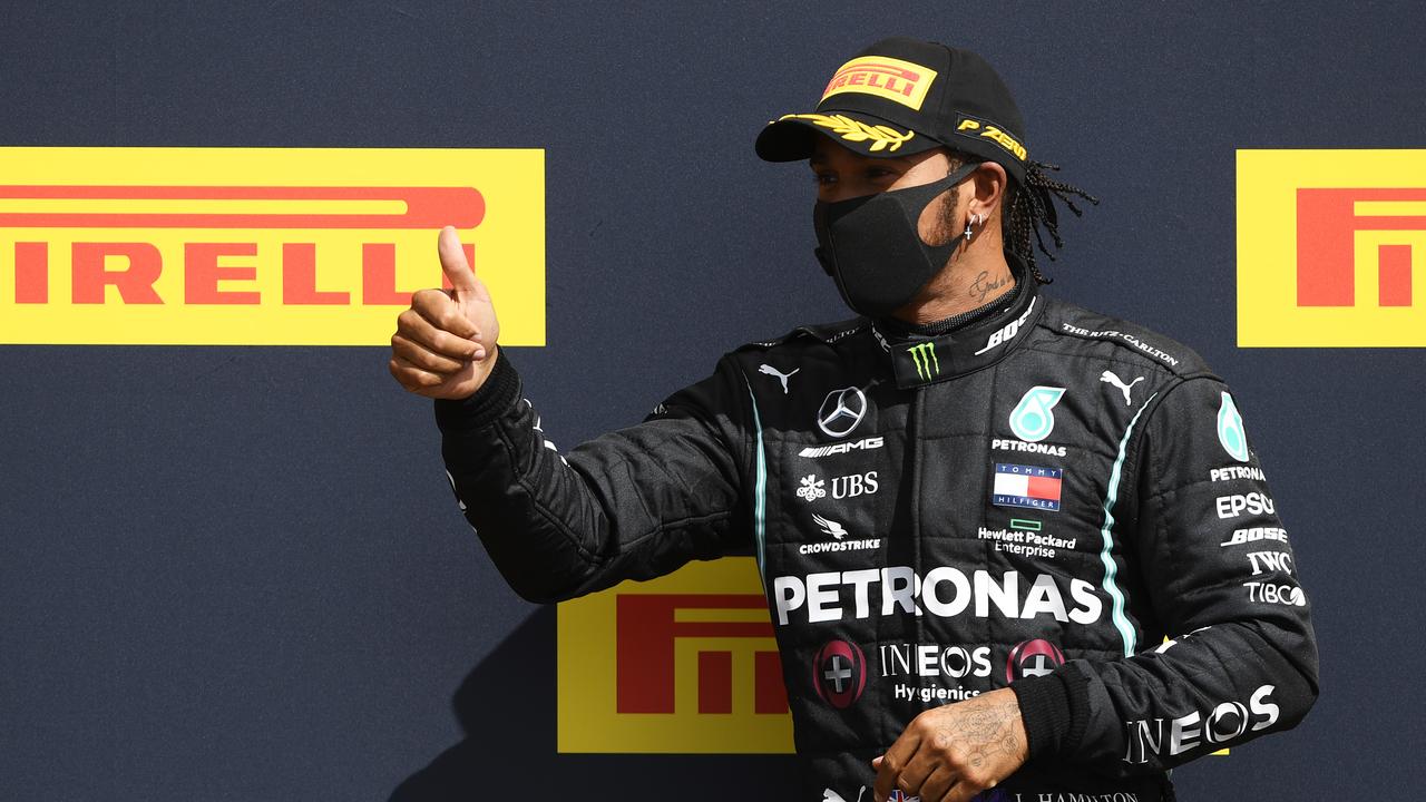 Lewis Hamilton celebrates another race win.