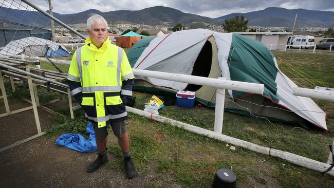 Royal Agricultural Society of Tasmania chief Scott Gadd checks on homeless people living in tents at the Hobart Showground in Glenorchy. Picture: CHRIS KIDD