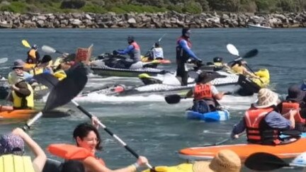 Scenes from the floating protest at Newcastle Harbour. Picture: Facebook