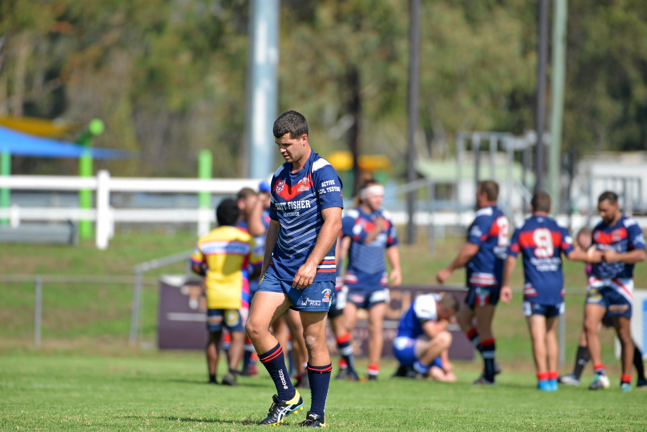 Brock Eastwell walks back to his side of halfway after a Warwick Cowboys try in second division at Father Ranger Oval. Picture: Gerard Walsh