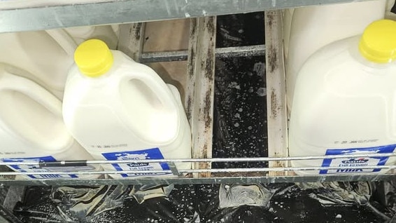 Mould was found in the milk fridge and on the roof at Woolworths Coolalinga. Picture: Supplied