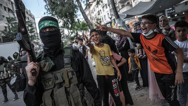 Fighters of Ezz al-Din Al-Qassam brigades, the military wing of Hamas, march in Gaza City on Saturday. Picture: Getty Images