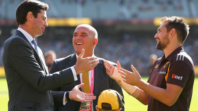 Hawthorn CEO Stuart Fox (centre) with AFL boss Gillon McLachlan and Hawks captain Luke Hodge.