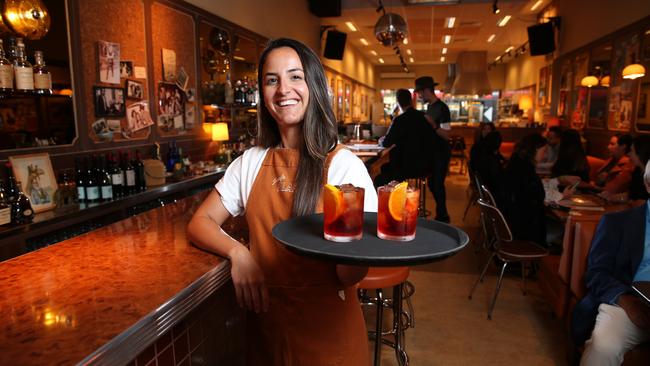 ‘Great to see people coming back into the city,’ says Bruna Daudt de Oliveira, assistant venue manager at Jimmy’s Falafel in the Sydney CBD. Picture: Britta Campion