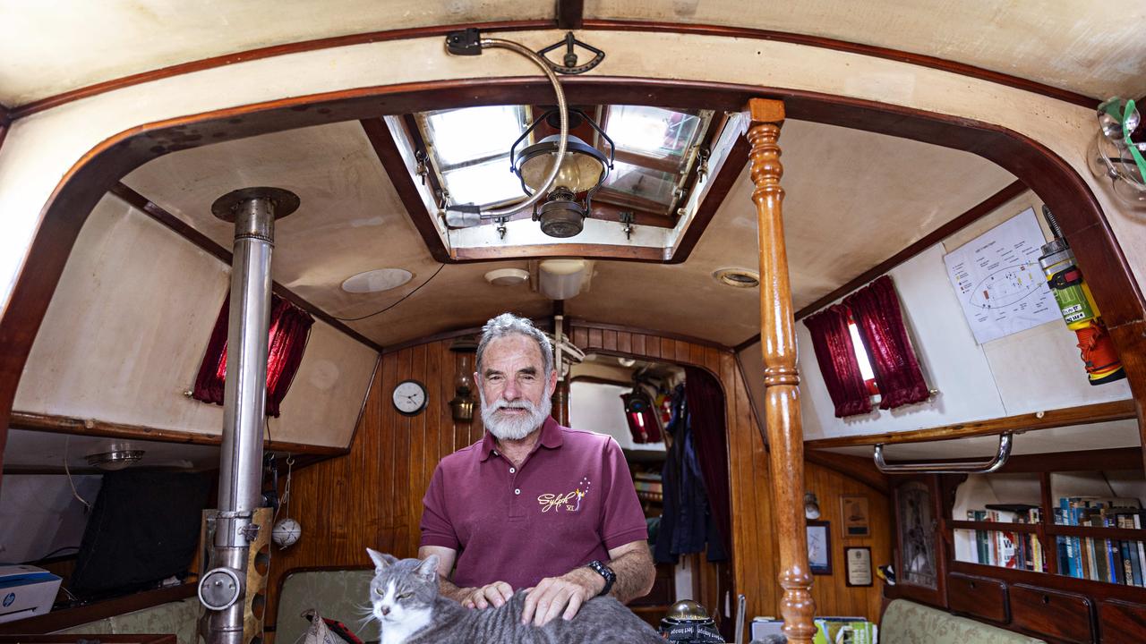 SYDNEY, AUSTRALIA, NOVEMBER 22, 2023. Sylph VI skipper and owner Robert â&#128;&#152;Bobâ&#128;&#153; Williams with his cat Oli who will sail with Bob in the Sydney to Hobart yacht race on board Sylph VI. Photographer: Adam Yip