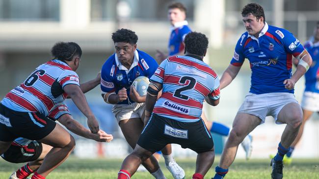 Manly player Dalys Esera on the burst. :