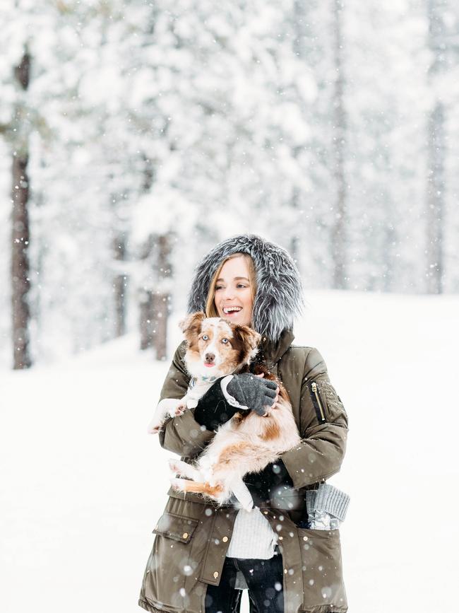 Lola the Mini Aussie ... “In Big Bear this weekend with all my fur and human friends. Can’t wait to run in the snow with everyone and this is my mom snuggling me .” Picture: Instagram