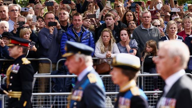 Crowd watched on solemnly as the cortege moved past. Picture: Henry Nicholls/Pool/AFP