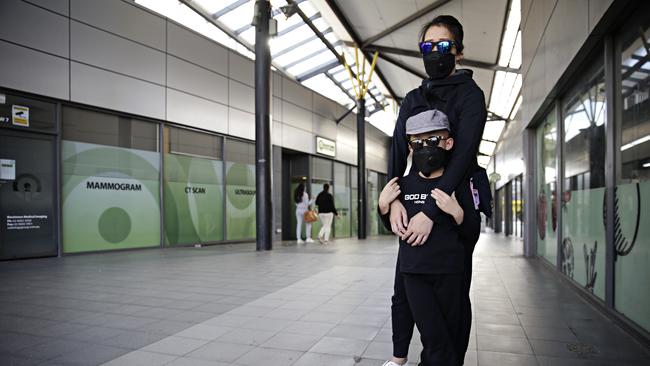 Hong Kong residents who are seeking protection visas, Karen and her son Wai (6), at Blacktown Station in Sydney. Population Minister Alan Tudge won’t guarantee that anyone in Australia who is fearful of returning to Hong Kong will be allowed to stay. Picture: News Corp