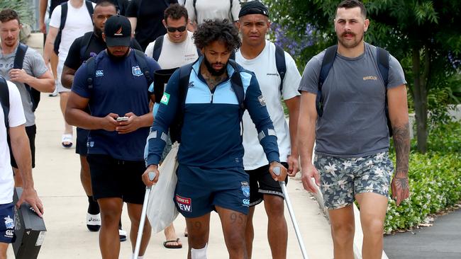 NSW Blues players speak to the media at the NSWRL Centre of Excellence after their win over Queensland in game 2 of the State of Origin series. Josh Addo-Carr (C) pictured on crutches after injuring his big toe on the left foot during last nights game. Picture: Toby Zerna