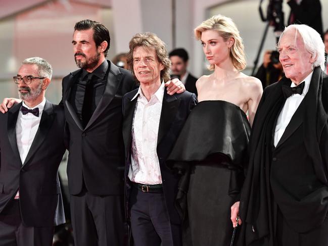 (From left) Italian director Giuseppe Capotondi, Danish actor Claes Bang, English singer, songwriter and actor Mick Jagger, Ausralian actress Elizabeth Debicki and Canadian actor Donald Sutherland arrive for the screening of the film The Burnt Orange Heresy during the closing night of the 76th Venice Film Festival in 2019.