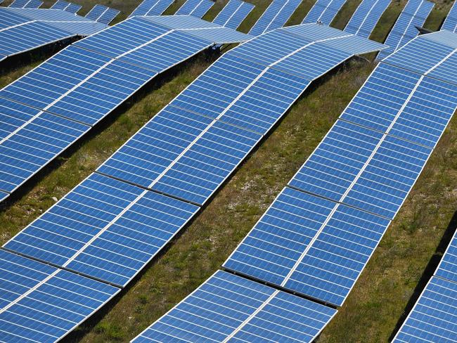 A view shows photovoltaic solar pannels at the power plant in La Colle des Mees, Alpes de Haute Provence, southeastern France, on April 17, 2019. - The 112,000 solar panels cover an area of 200 hectares with a total capacity of 100MW. (Photo by GERARD JULIEN / AFP)