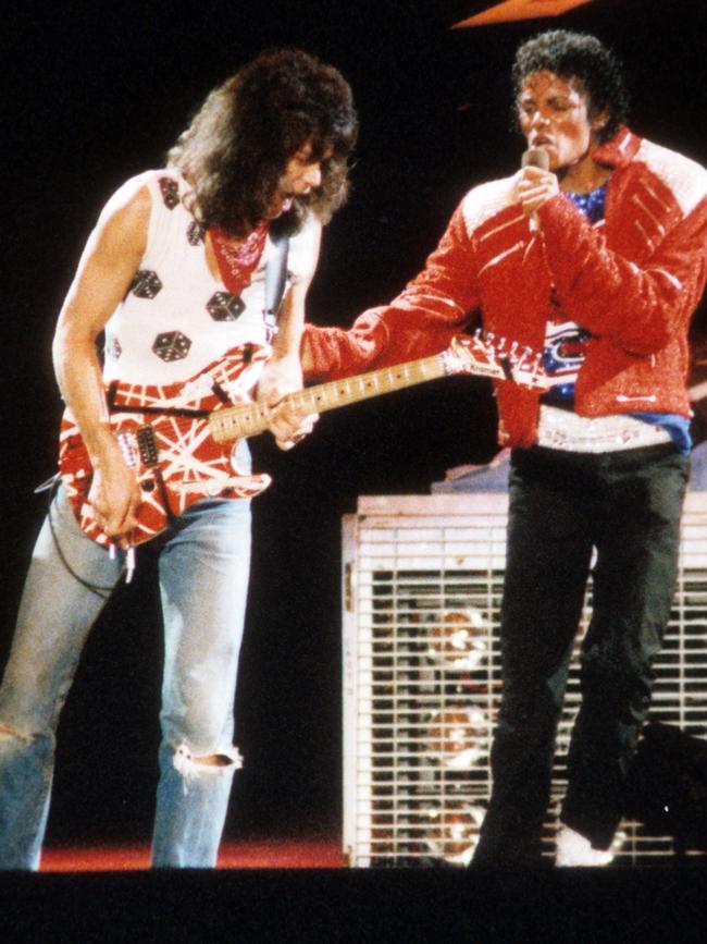 Eddie Van Halen and Michael Jackson perform Beat It in 1984 at Texas Stadium in Dallas. Picture: Getty Images