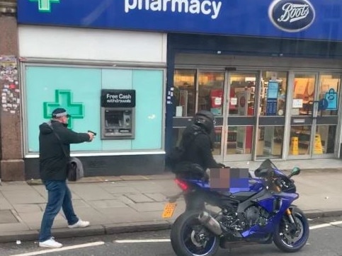 Police aim their guns at the man suspected of carrying out "terrorist related" stabbings in London. Picture: Twitter