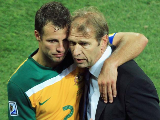 Verbeek with defender Lucas Neill after the Socceroos were eliminated from the 2010 World Cup in South Africa. Picture: Getty Images