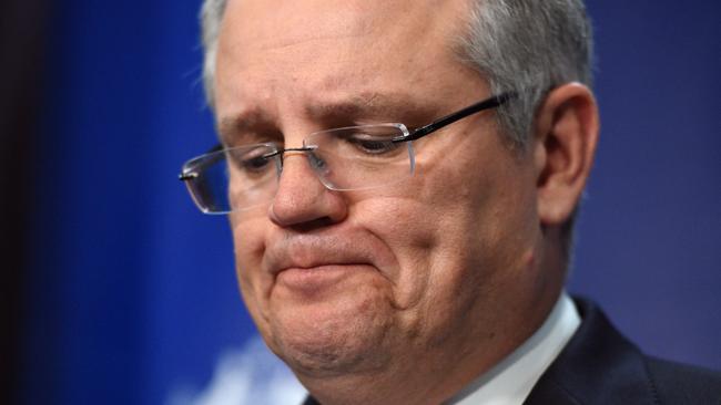 Treasurer Scott Morrison celebrated 25 years of uninterrupted economic growth in Australia. Picture: AAP/Mick Tsikas