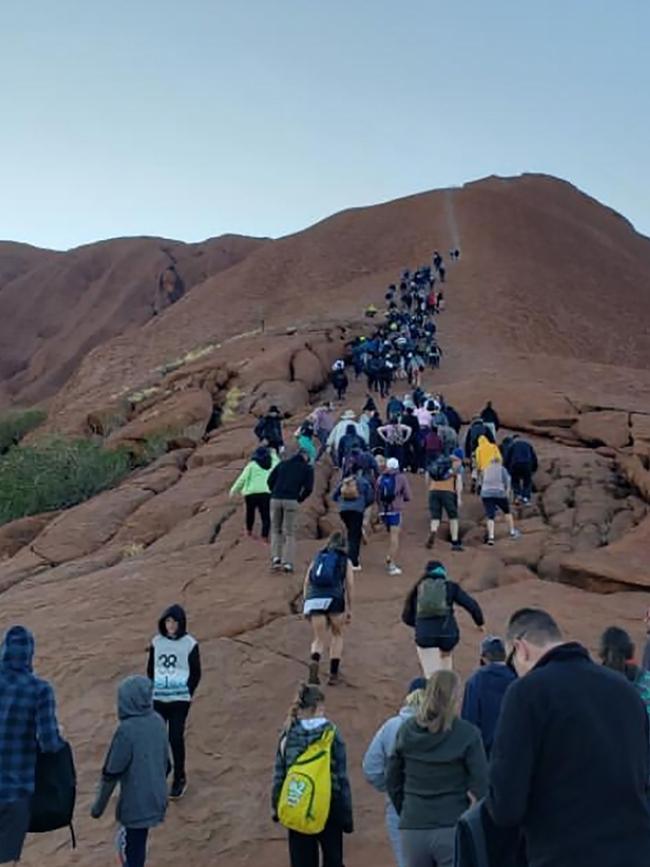 Tourists have flocked to Uluru in Australia's Northern Territory to climb the landmark before the ban. Picture: @koki_mel_aus. / AFP